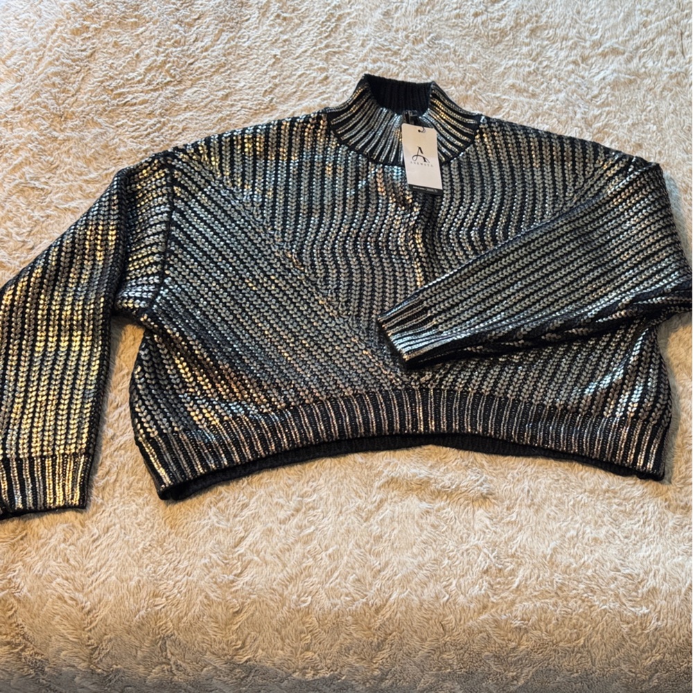 Shimmering Black and Gold Turtleneck Sweater